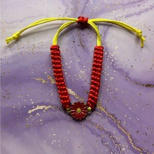 Handmade red and yellow adjustable flower bracelet